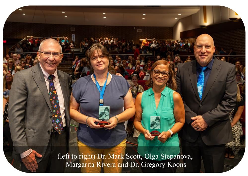   Photo of (left to right) Dr. Mark Scott, Olga Stepanova, Margarita Rivera and Dr. Gregory Koons